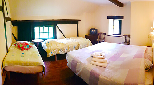 Unser Vierbettzimmer mit Einzelbetten. (K4)